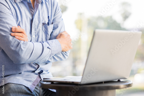 businessman working on laptop Horizontal simulated blur background