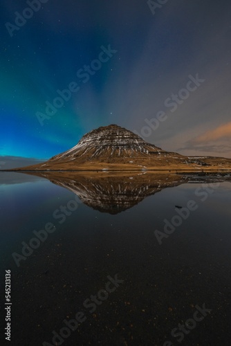 Aerial view of mountain with reflection in water photo