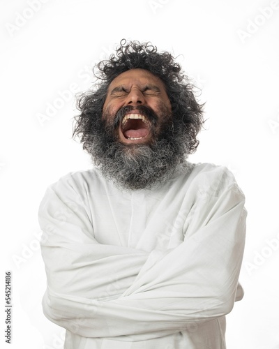 Crazy man expressing anger and discomfort in a straitjacket - the concept of mental illness and rage