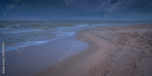 An autumn seascape waves and dark clouds