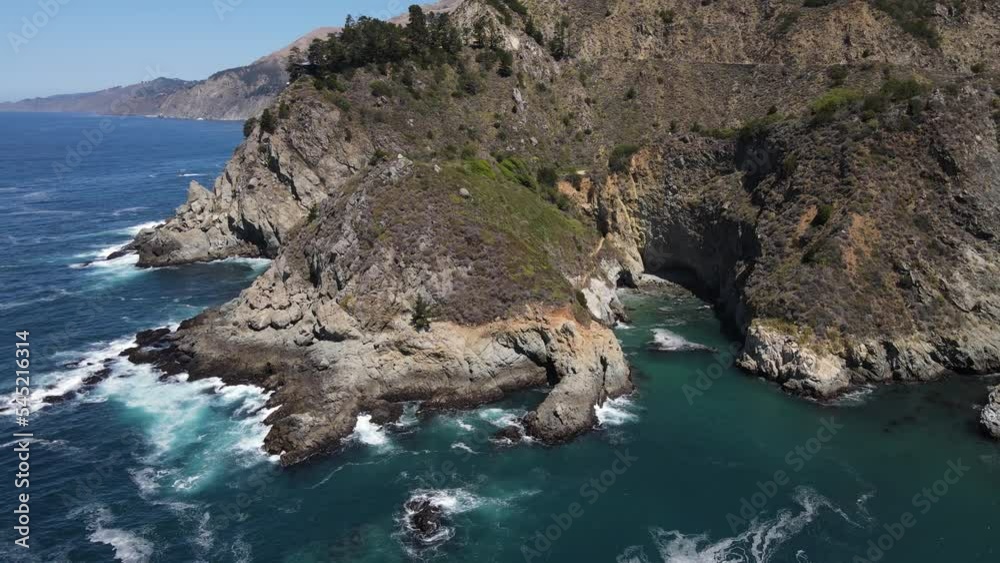 Aerial shot of the rugged coastline along the Pacific Coast Highway in Central California Aerial shot of the rugged coastline along the Pacific Coast Highway in Central California