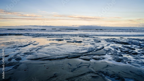 View of Moeraki Boulders Beach, Hampden, New Zealand. © Igor Kondler/Wirestock Creators