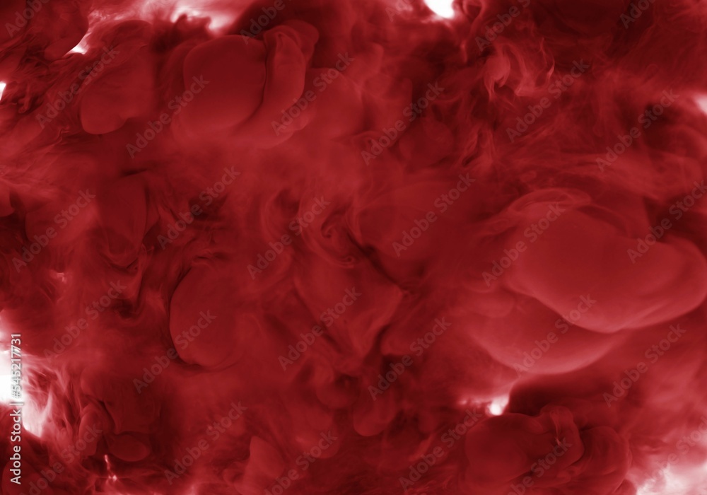 Smoke like shot of red ink in water for cool background Smoke like shot of red ink in water for cool background