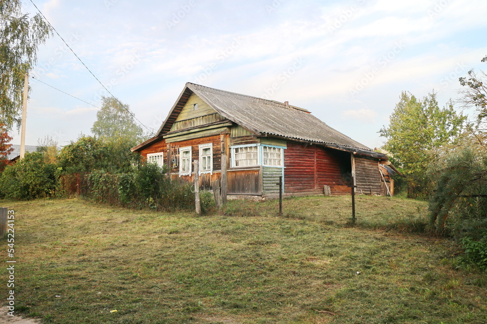 Obraz premium rural house in summer in the countryside