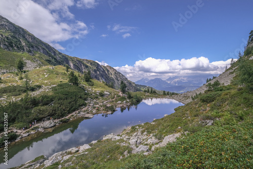 View of Spiegelsee  Mirror lake  as seen on the trial from Rippetegg summit back to Rieteralm  Schladming  Styria  Austria