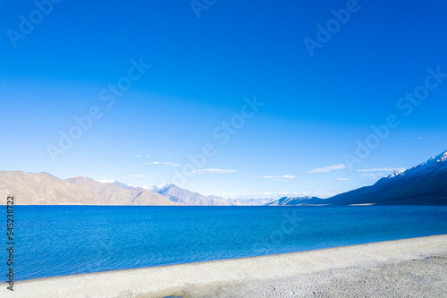 Aerial landscape of Pangong Lake and mountains with clear blue sky, it's a highest saline water lake in Himalayas range, landmarks and popular for tourist attractions in Leh, Ladakh, India, Asia 
