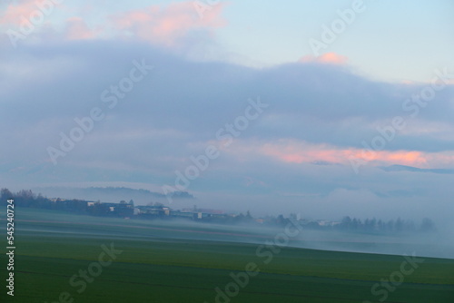 steirischer Ort versinkt im Neble photo