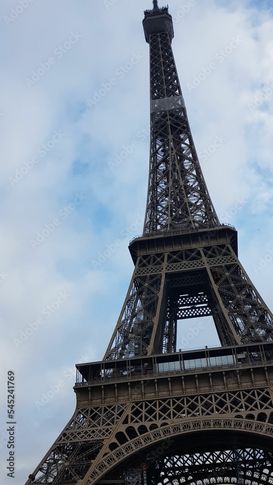 Vertical low-angle view of the Eiffel tower landmark located in Paris, France