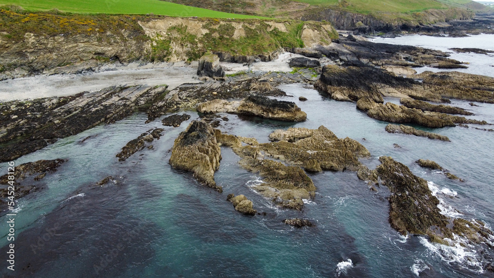 Bright coast. Beautiful Northern European nature. Aerial view of the rocky coastline. Aerial photo. View from above. Bright coast. Beautiful Northern European nature. Aerial view of the rocky coastline. Aerial photo. View from above.