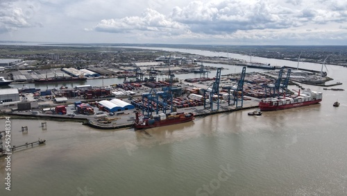 Tilbury Docks container port on River Thames ships loading .drone aerial view