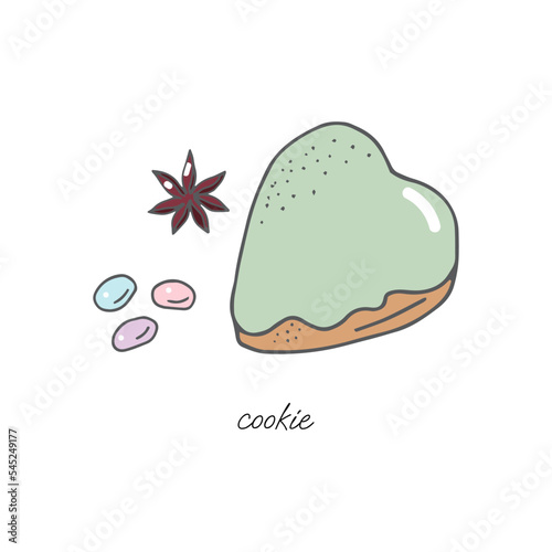 Cookies in the form of a heart in glaze, dragee and star anise