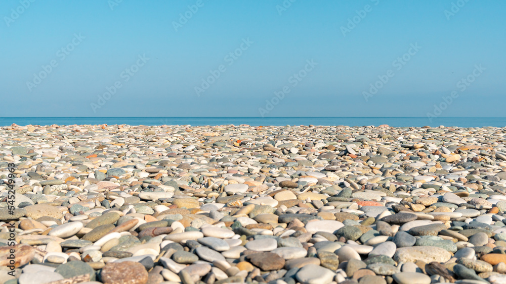 Beautiful pebble beach landscape in Batumi, sunny day Beautiful pebble beach landscape in Batumi, sunny day