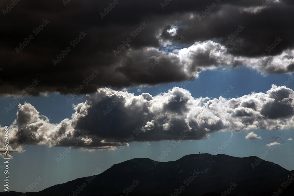 dramatic clouds over the mountains