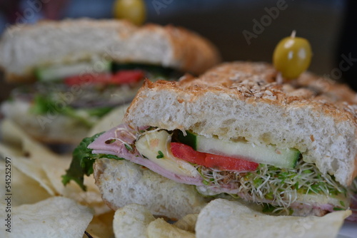 Ciabatta con jamón y pepino, chapata, chabata, torta de jamón photo