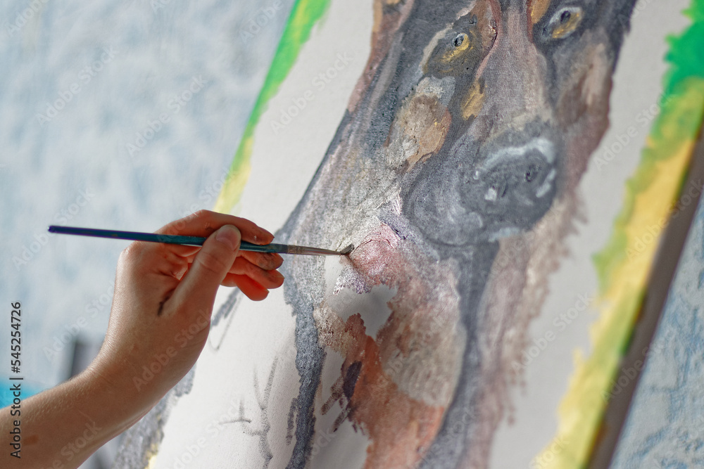Obraz premium Woman drawing shepherd dog, animal art, oil paints