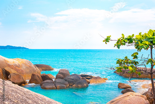 Beautiful seascape.Rocky shore of the blue sea on the tropical island of Koh Samui in Thailand. Travel and tourism