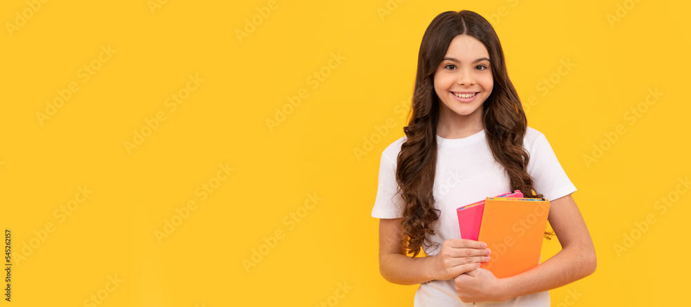 smiling school child ready to study with workbook, school. Banner of schoolgirl student. School child pupil portrait with copy space. smiling school child ready to study with workbook, school. Banner of schoolgirl student. School child pupil portrait with copy space.