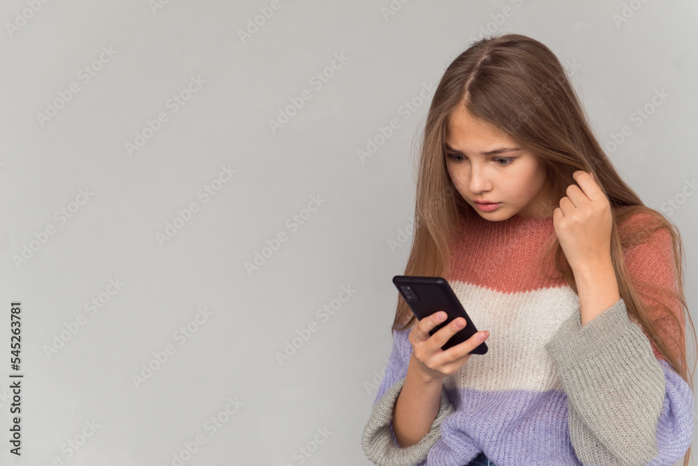 teenager girl isolated portrait using smartphone teenager girl isolated portrait using smartphone