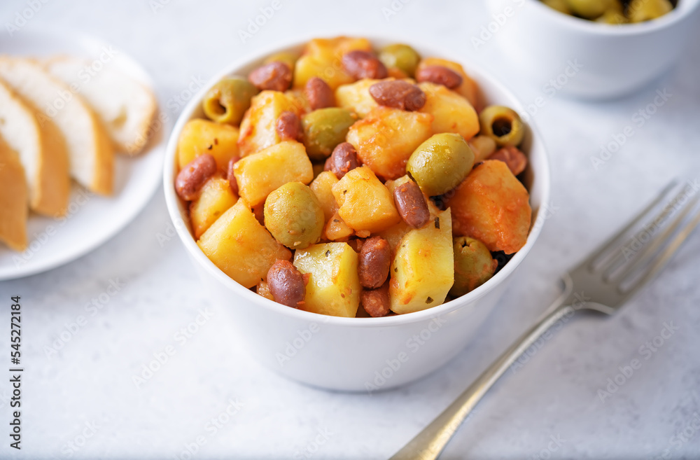 Puerto Rican traditional potato red kidney bean stew in a bowl Puerto Rican traditional potato red kidney bean stew in a bowl