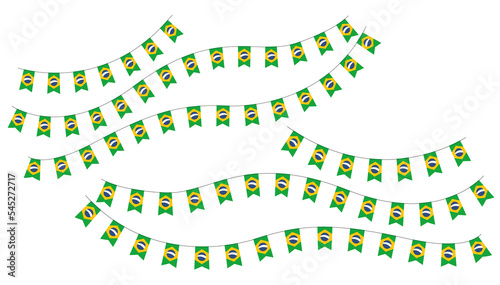 Bandeirolas ou bandeiras do Brasil na corda. Decoração com fundo transparente para campanhas de torcida da Seleção Brasileira de copa do mundo 2022 de futebol. photo