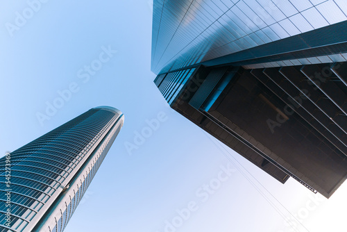 Skyscrapers photographed from below on a sunny day