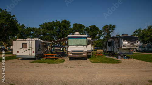 Billede på lærred Camping at campsites in different types of Rv trailers and motorhomes