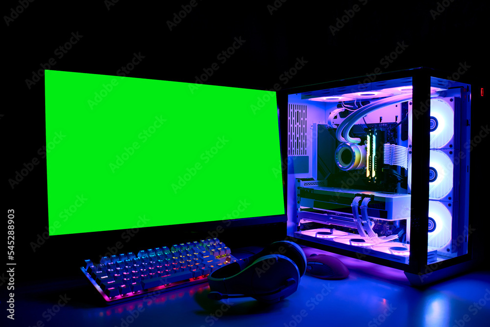 Gaming PC with RGB LED light, keyboard, mouse, headphones and monitor with  green screen, copy space. Gamer's workspace. Modern powerful liquid-cooled  Computer in a glass case Stock Photo | Adobe Stock