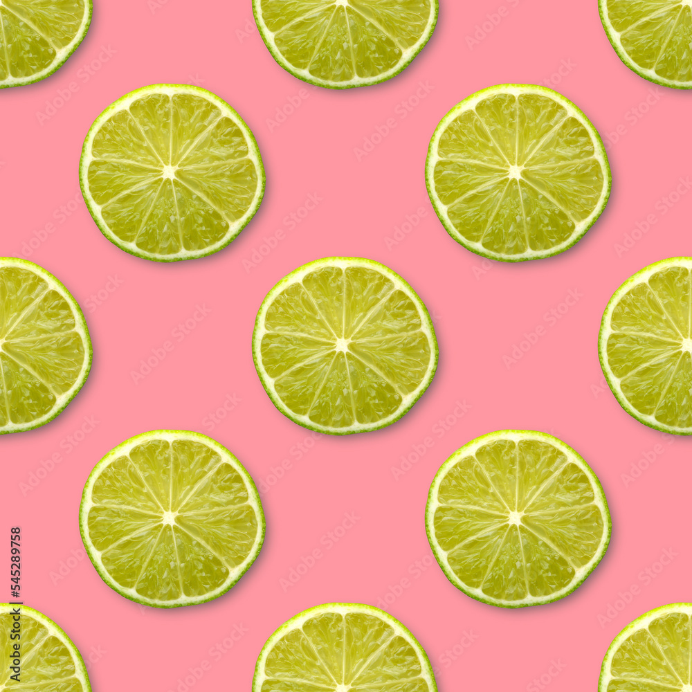 lime halves on a pink background, seamless pattern, top view. fruit citrus backdrop.