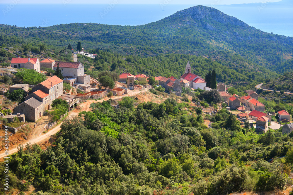 Bird view of Velo Grablje. Historic village on Hvar island in Croatia famous for lavender, red vine and olive oil production. Aerial view from an old mountain road.