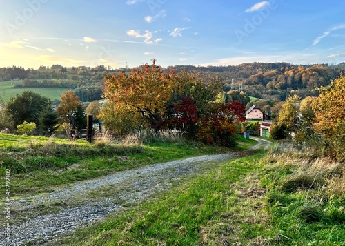 dirt road in rural landscape photo