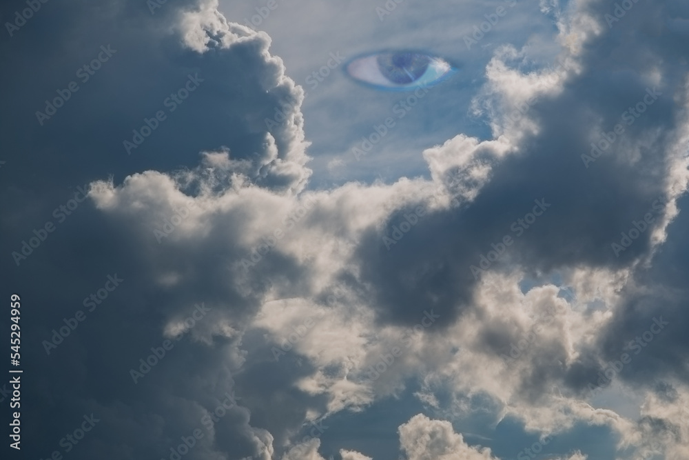 Eye in the sky watching from above. All seeing eye in the sky. Blue eye