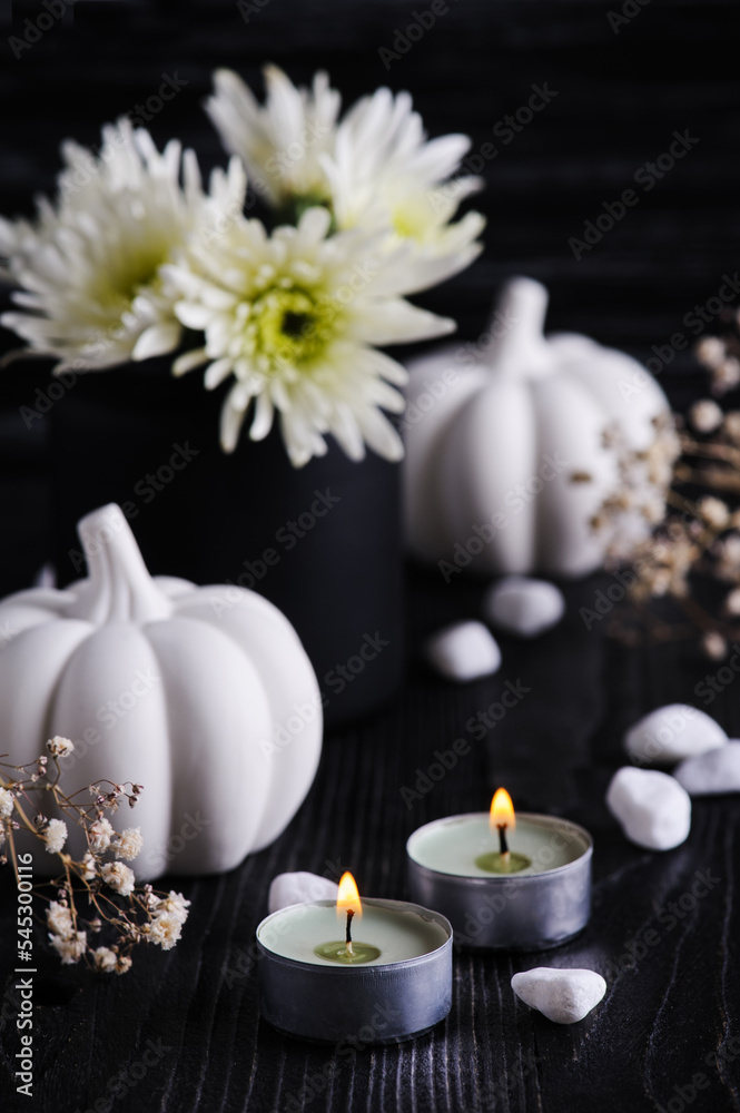 Fall decoration with white pumpkins and chrysanthemum