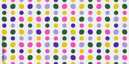 Colorful dot pattern. Seamless pattern of colorful dots on a white canvas. For print and interior design, vector pattern.