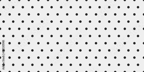 Polka dot pattern. Seamless pattern of black dots on a white canvas. For print and interior design, vector pattern.