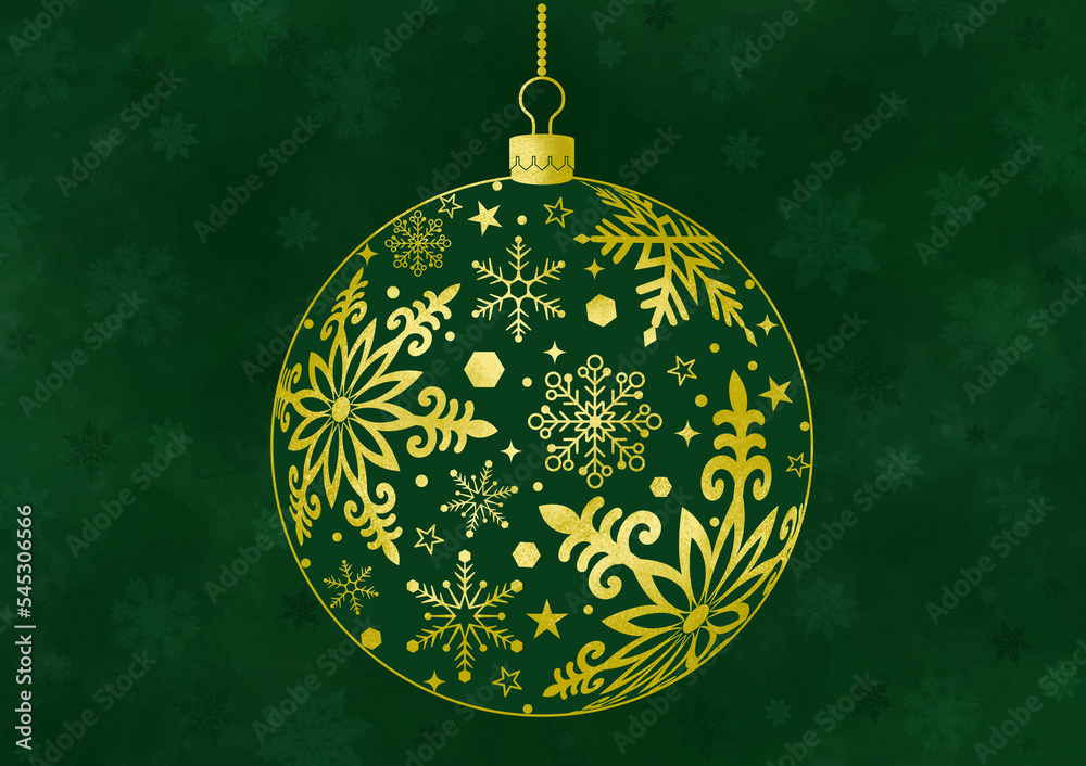 グリーンの背景と、金色クリスマスボールのクローズアップ