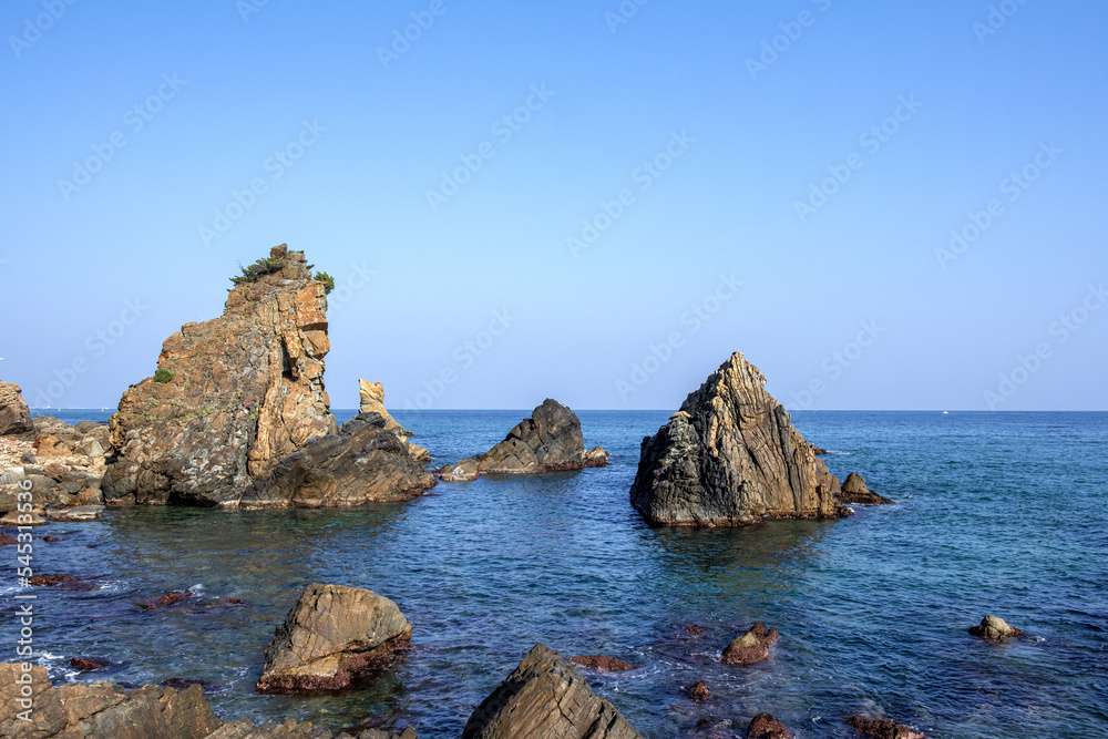 Beautiful rock and bolders on the seashore along the coastline 
