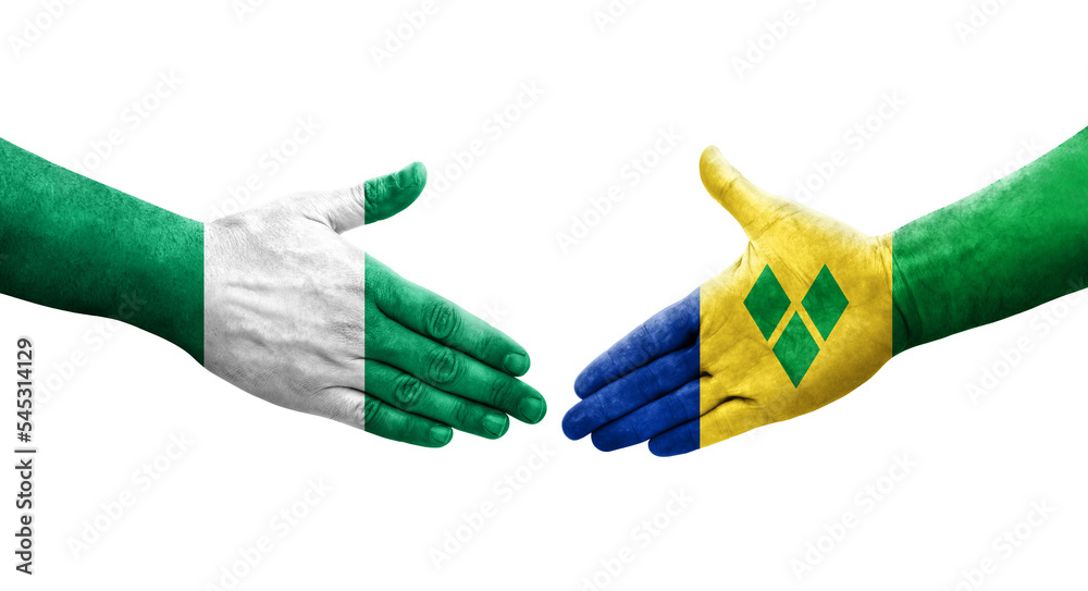 Handshake between Saint Vincent Grenadines and Nigeria flags painted on hands, isolated transparent image.