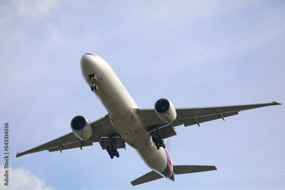 Airplanes, passengers flying in the sky, preparing to land at the airport