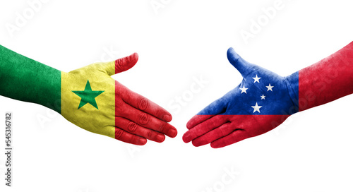 Handshake between Samoa and Senegal flags painted on hands, isolated transparent image.