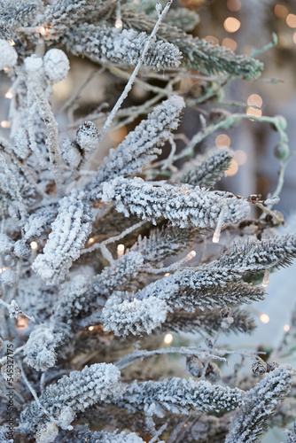 Snowy toy tree, close-up christmas tree