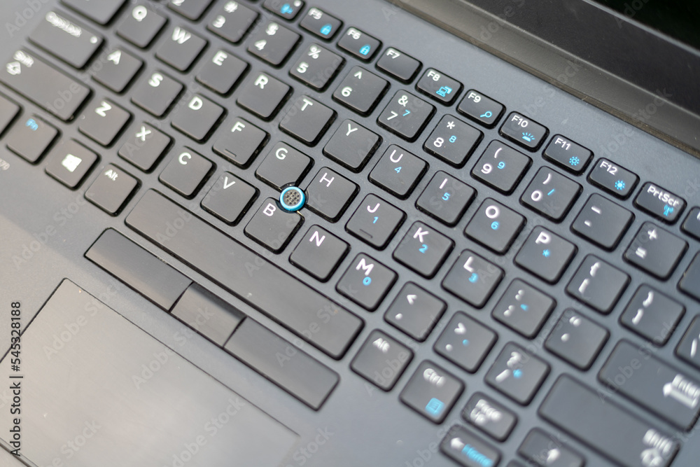 High angle view of black laptop keyboard with selective focus. High angle view of black laptop keyboard with selective focus.