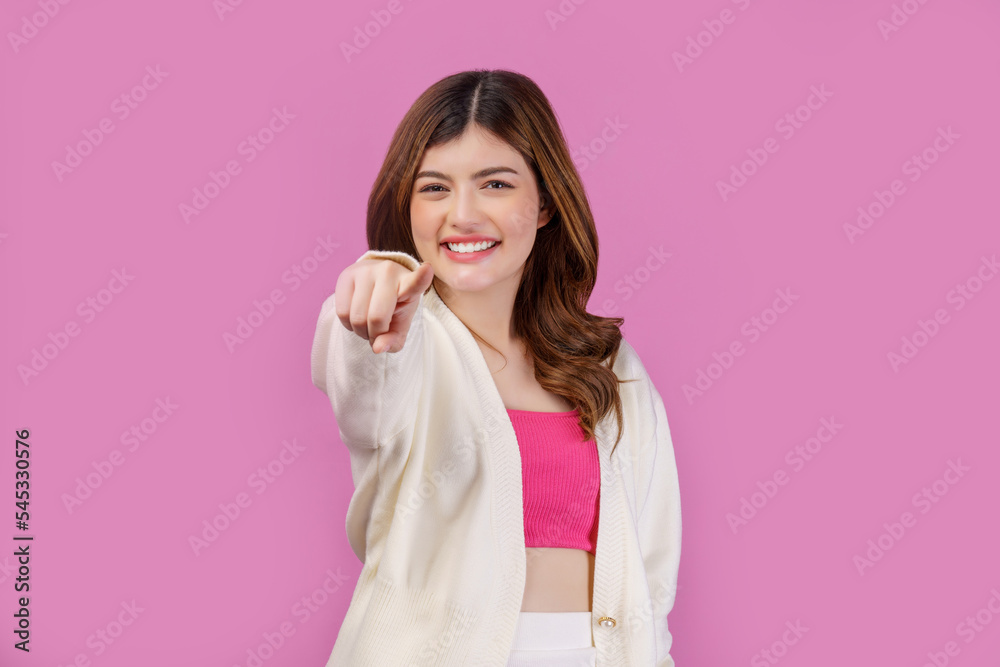 Portrait of delighted woman looking and pointing finger at camera isolated over pink background Portrait of delighted woman looking and pointing finger at camera isolated over pink background