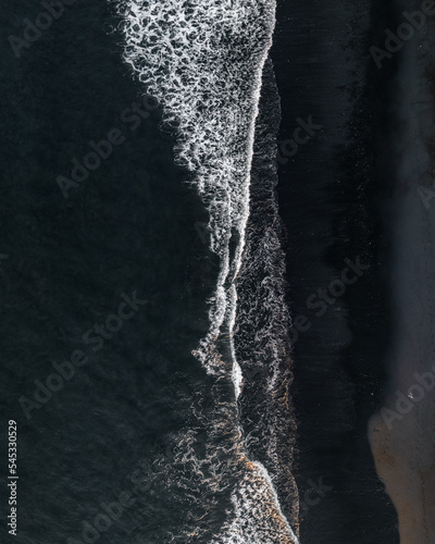 Fototapeta Naklejka Na Ścianę i Meble -  Black sand beach in Bali