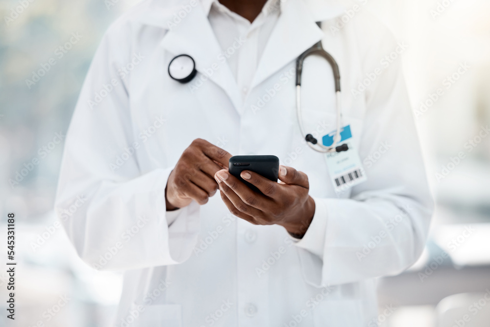 Doctor, hand and phone browsing the internet for medical reseacrch in a healthcare clinic for medicine. Wifi, social media and online search of cardiologist for examination treatment or cure Doctor, hand and phone browsing the internet for medical reseacrch in a healthcare clinic for medicine. Wifi, social media and online search of cardiologist for examination treatment or cure