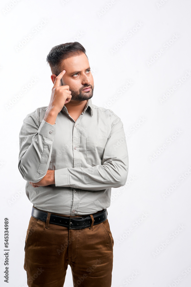 Indian man giving thinking expression on white background. Indian man giving thinking expression on white background.