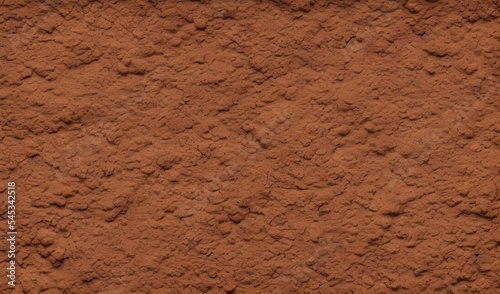 Dark brown cracked terracotta texture background photo