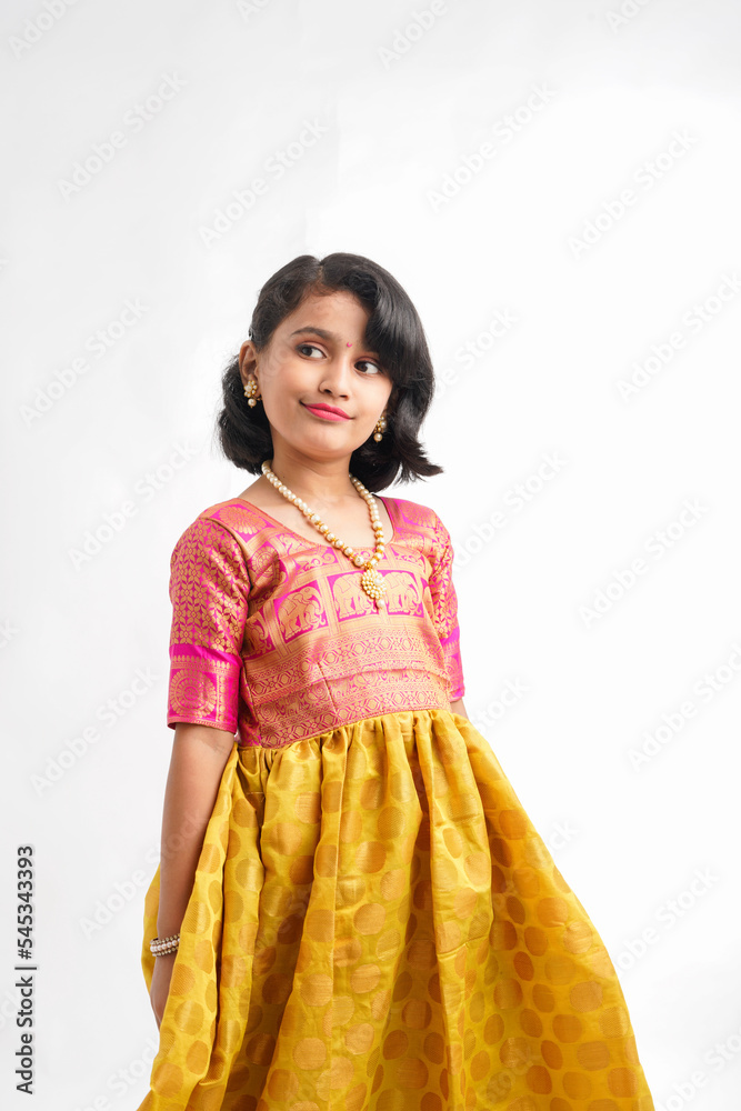 Cute indian little girl giving expression on white background Cute indian little girl giving expression on white background