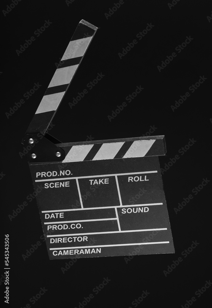 Movie clapperboard isolated on black background