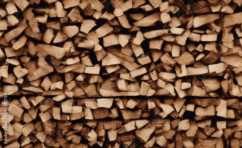 Pile of a dry chopped firewood logs