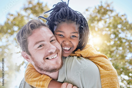 Family, happiness and adoption with a father and child outdoor with trust for piggy back ride for love and support with a smile in summer. Portrait of a man and foster kid in a nature park for fun photo